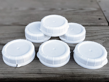 https://www.redhillgeneralstore.com/housewares/kitchen/kitacc/milk/Glass-Milk-Bottle-Lids.jpg