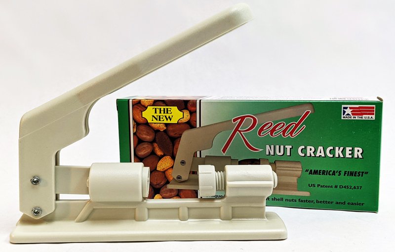 Reed nut cracker made in the USA with its box